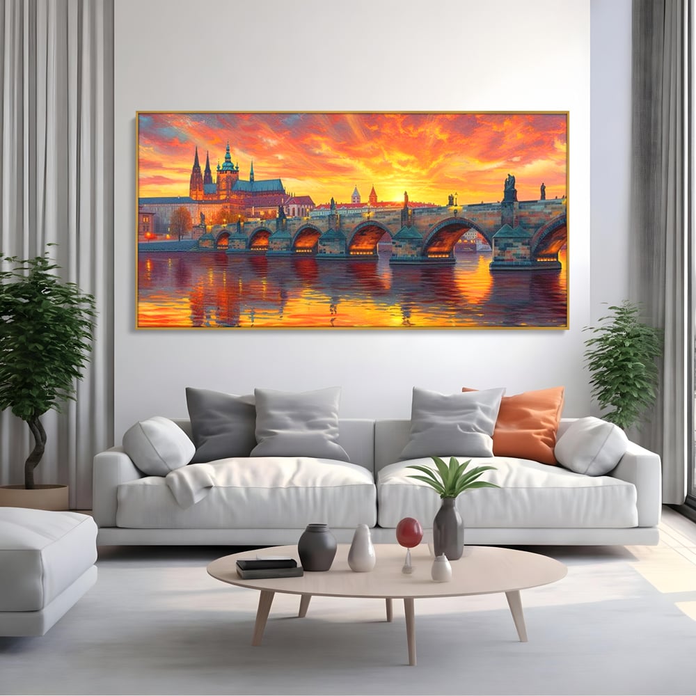 Tablou canvas cu tablou canvas cu apus de asfintit peste praga, in rama de aluminiu auriu, pe perete intr-un living